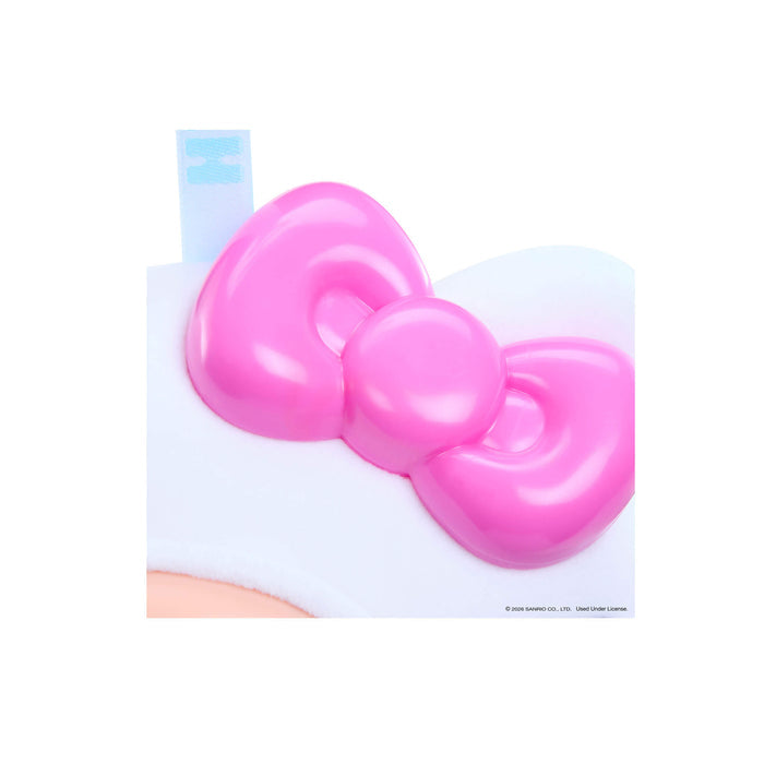 Pink bow-shaped object on a white background