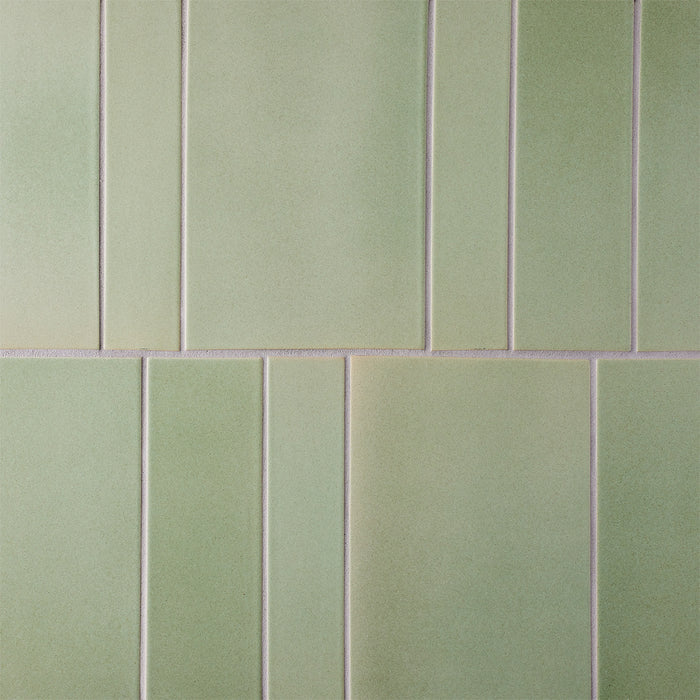Caption: Classic Field 6x12, 3x12, 2x12 in M120 Patina Manganese. Prism Natural Grey grout by Custom Building Products.