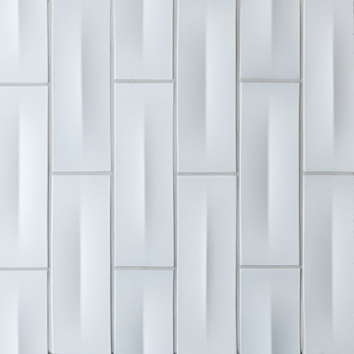 Caption: Dimensional Crease In & Crease Out in M124 Powder. Prism Cape Grey grout by Custom Building Products.