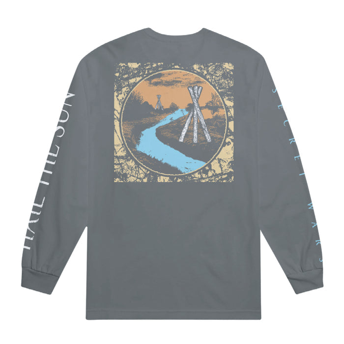 Back of long sleeve shirt with a drawing of wooden structures lining a river running into the distance.