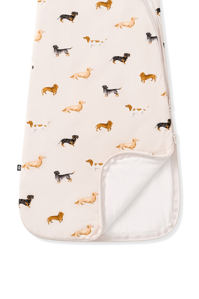 Bottom part of Beige Sleep Bag with Dachshund print on a white background