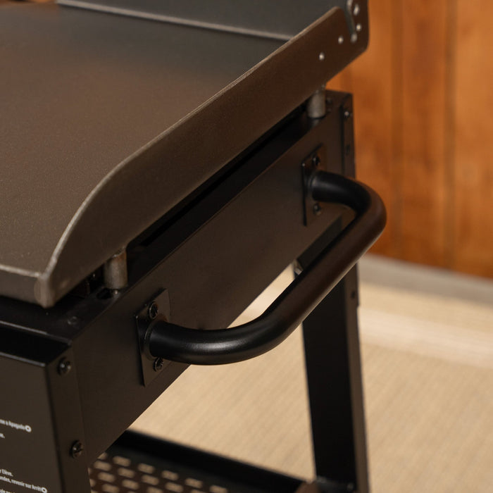 Opposite of the side shelf is a handle for easy maneuverability.