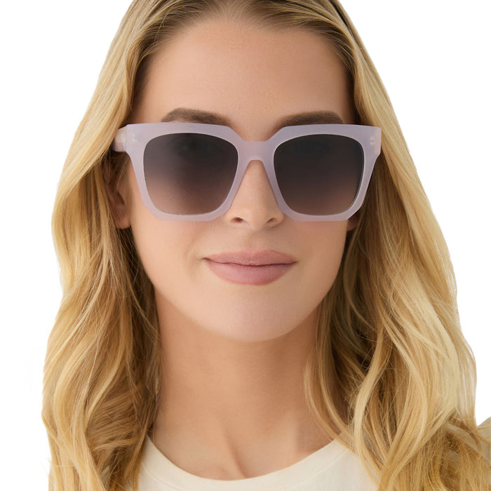 on model - female wearing diff eyewear featuring the ariana oversized square sunglasses with a thistle frame and grey gradient lenses front view