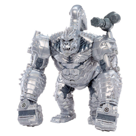 A metallic silver robotic gorilla toy figure with a skull-like face, armored body, and a large hammer-like weapon on its right shoulder, shown against a plain white background.