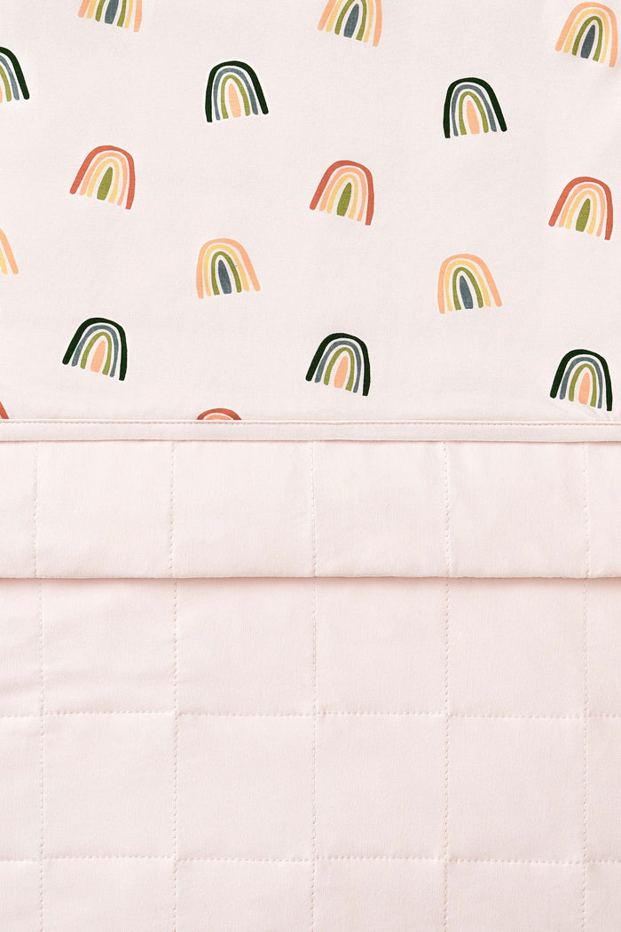 Front and back of vanilla cream Baby Blanket with Retro Rainbow print