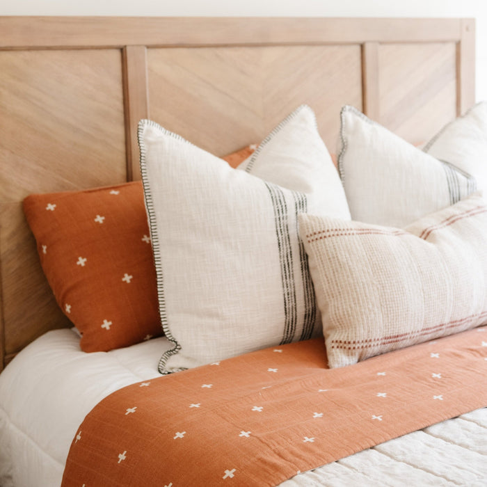 Vibrant and fun, rust colored, lightweight bamboo muslin pillow covers.