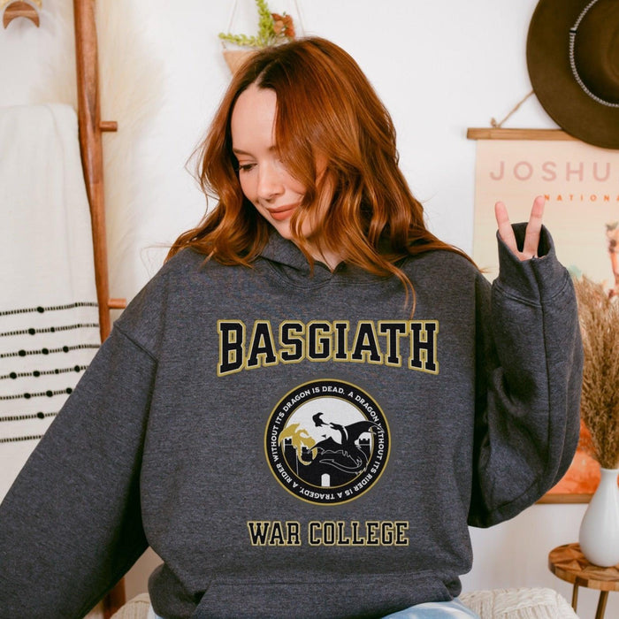 Basgiath War College Hoodie - The Bean Workshop - Basgiath War College Varsity Hoodie Fourth Wing Fan Gift, Black Gold Seal Dragon Hoodie, Bookish Streetwear Premium Style, Dragon Rider Collegiate Cozy Hoodie Fantasy Book Lover, Empyrean Series, Fall Winter Bookish Fandom Wear, fourth wing, Fourth Wing Fandom, Gift for Fantasy Reader, hoodie, Navarre War College Varsity Badge, rebecca yarros, Rider Dragon Flight Graphic Hoodie, Varsity Collegiate Aesthetic