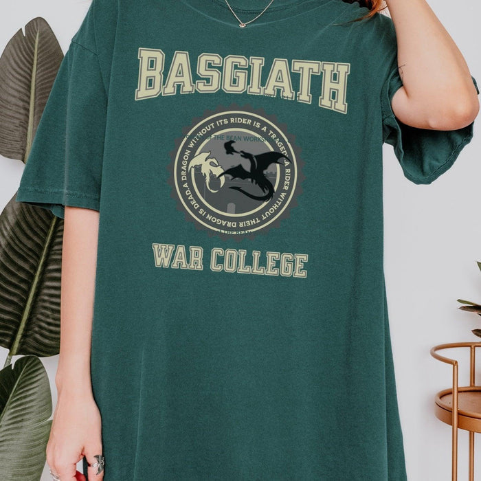 Basgiath War College T-Shirt - The Bean Workshop - Basgiath War College Varsity T-Shirt Fourth Wing Fan Gift, Black Gold Seal Dragon Graphic, Bookish Streetwear Style, BookTok Bookstagram Outfit Idea, box tee, Dragon Rider Collegiate Graphic Tee Fantasy Book Lover, Empyrean Series, Everyday Fandom Casual Wear, fourth wing, Fourth Wing Fandom, Navarre Varsity Badge Design, rebecca yarros, Rider Dragon Flight Illustration, Varsity Collegiate Aesthetic