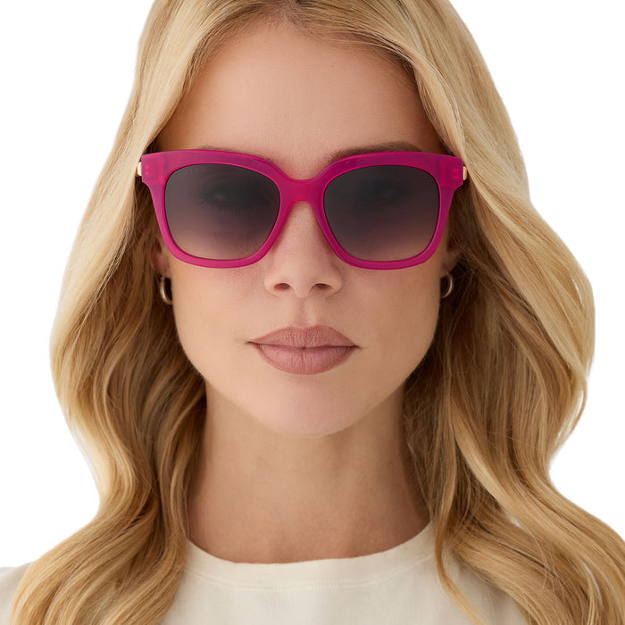 on model - female wearing diff eyewear featuring the bella square sunglasses with a bright tulip with gold frame and grey gradient lenses front view