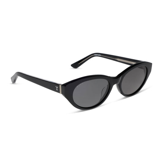 yellowstone x diff eyewear featuring the teeter round sunglasses with a classic black acetate frame and grey polarized lenses angled view