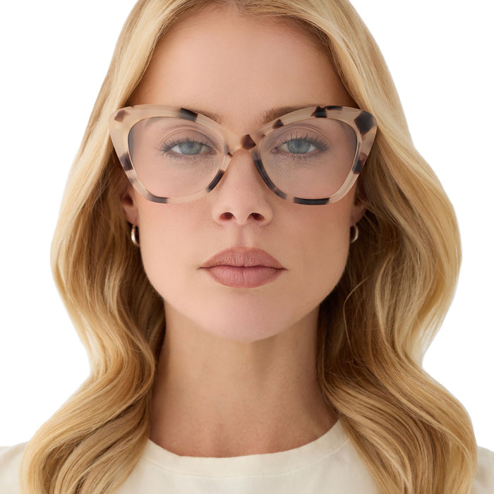 on model - blonde female wearing diff eyewear featuring the betty cat eye prescription glasses with a cream tortoise frame front view