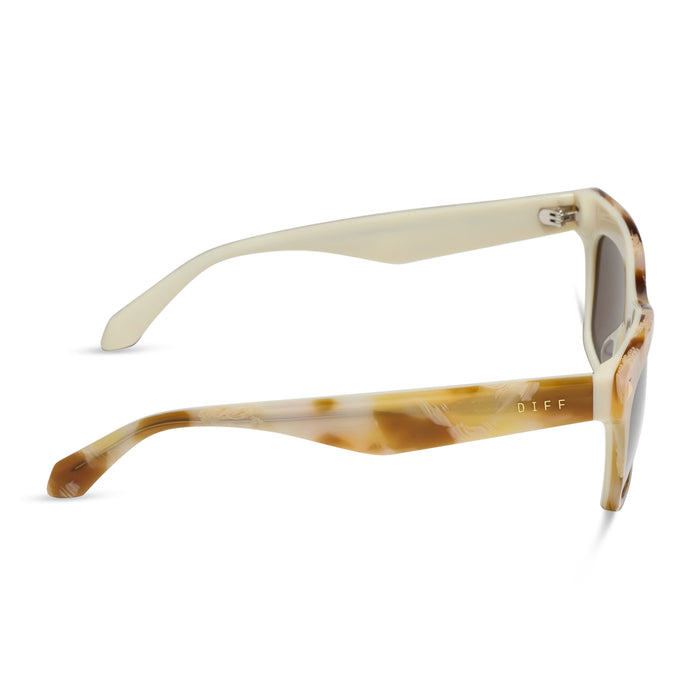 diff eyewear featuring the bradley cateye sunglasses with a gilded tortoise outside and courtside ivory inside acetate frame and brown lenses side view