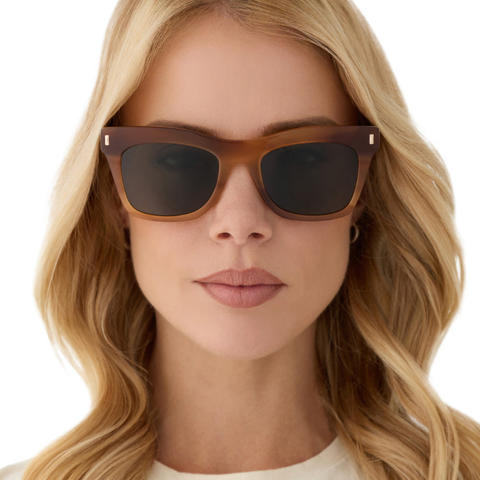on model - female wearing diff eyewear featuring the bradley cateye sunglasses with a tawny brown tortoise frame and g15 polarized lenses front view