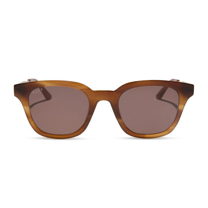 diff eyewear featuring the bridget round sunglasses with a tawny tortoise frame and brown lenses front view