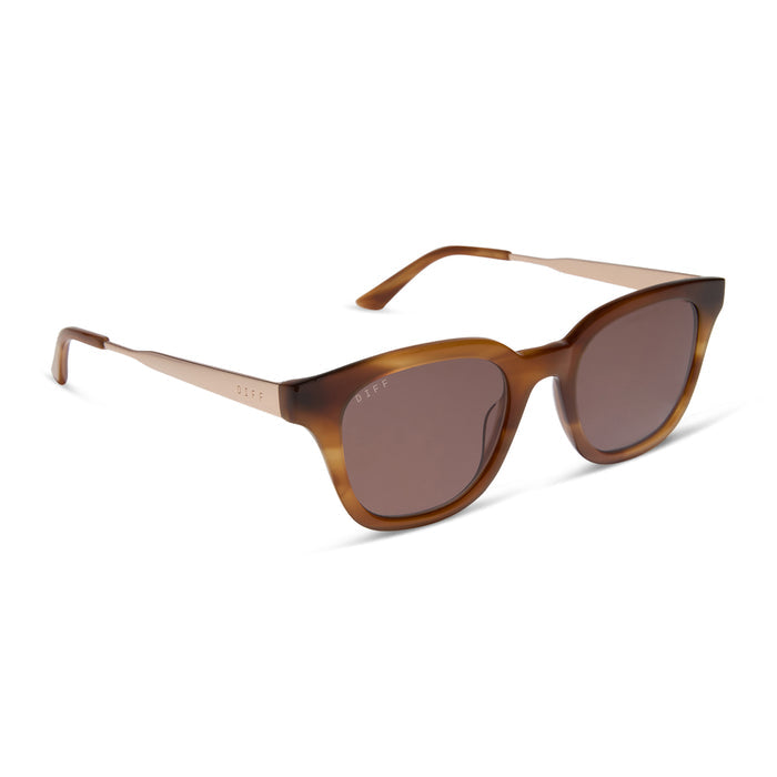 diff eyewear featuring the bridget round sunglasses with a tawny tortoise frame and brown lenses angled view