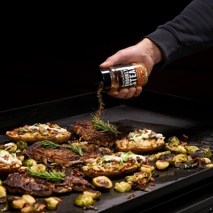 Brooklyn Steak Seasoning put on steaks on the griddle.
