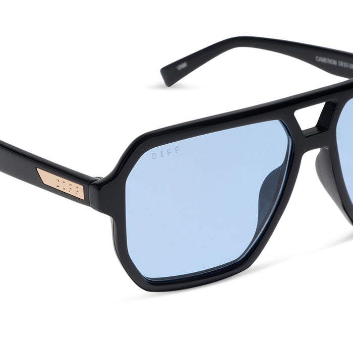 diff eyewear cameron navigator sunglasses with a black acetate frame and blue tint lenses detailed view