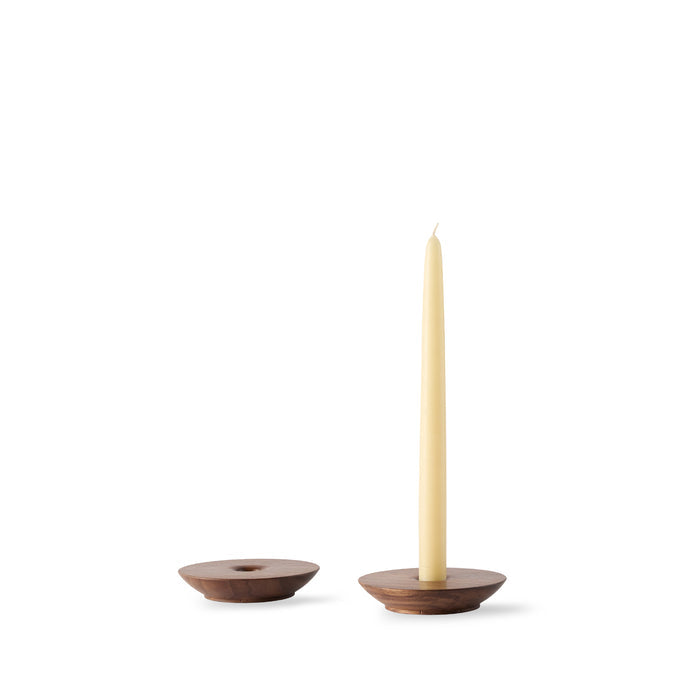 Two De Jong & Co wooden round candleholders with one candle