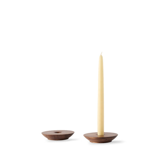 Two De Jong & Co wooden round candleholders with one candle