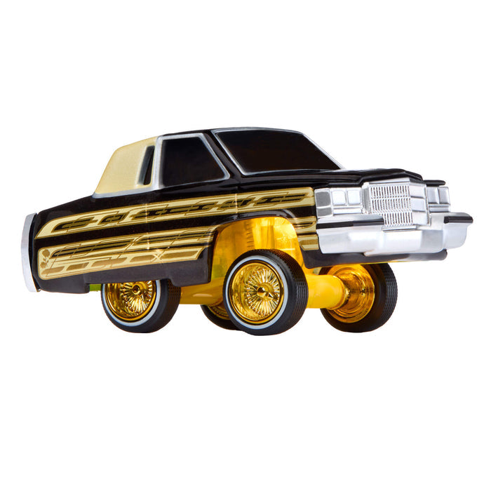 Toy car with gold and black design on a white background