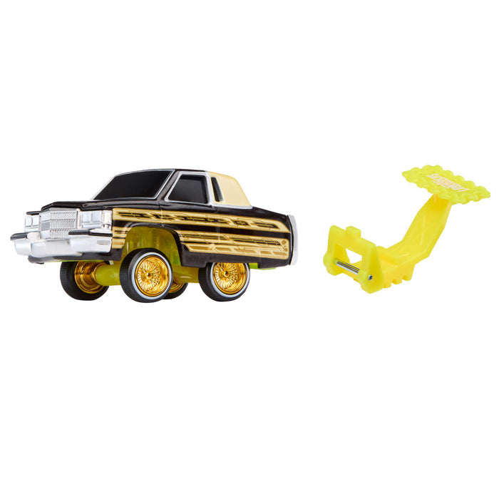 Toy car with a yellow tool on a white background
