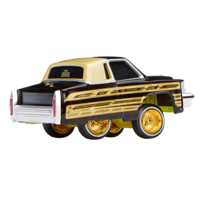 Car with gold and black design on a white background