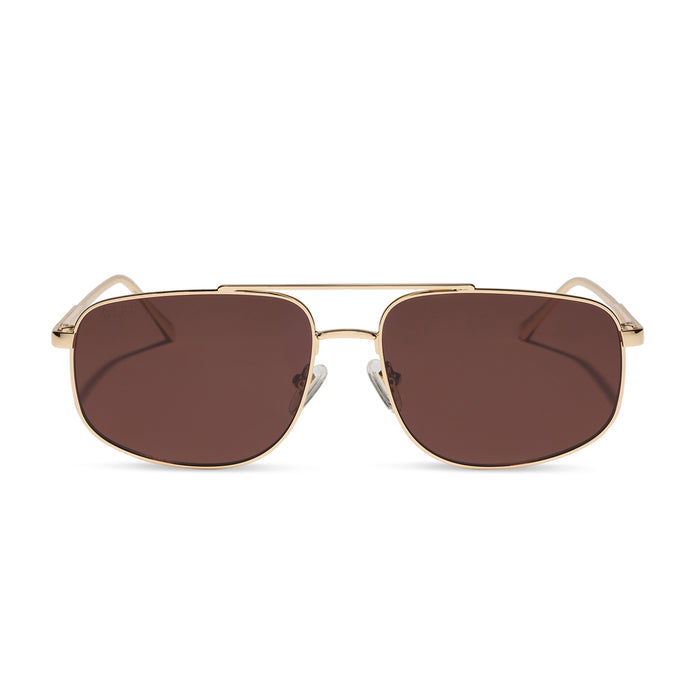 diff eyewear featuring the charley navigator sunglasses with a gold metal frame and brown polarized lenses front view