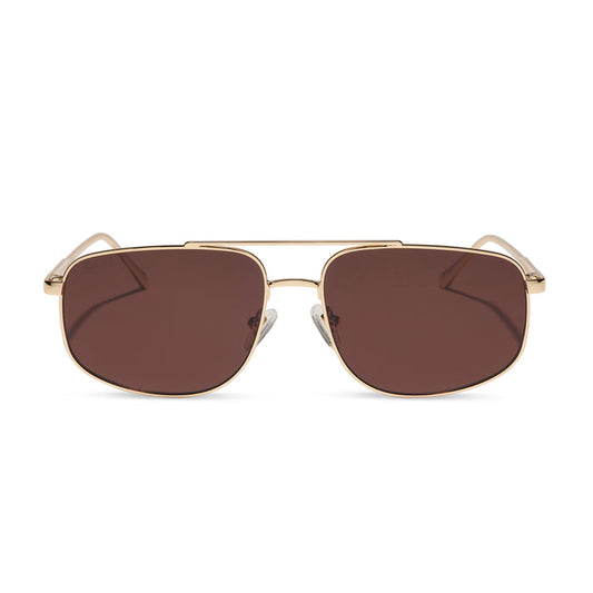 diff eyewear featuring the charley navigator sunglasses with a gold metal frame and brown polarized lenses front view
