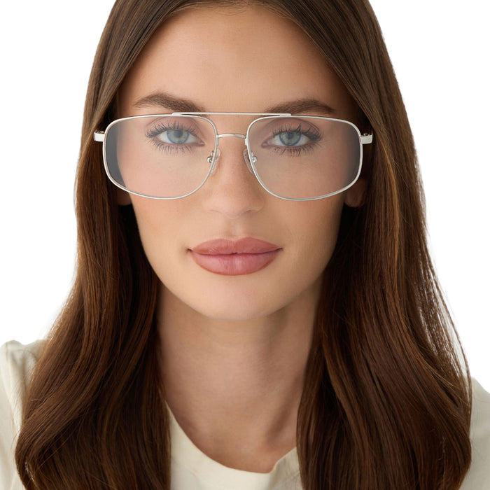 on model - female wearing diff eyewear featuring the charley navigator prescription glasses with a silver frame front view