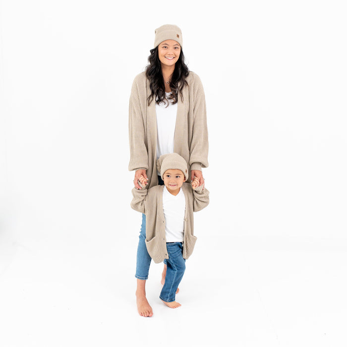 Mom and daughter wearing matching Kyte Baby Chunky Oversized Cardigans in Almond