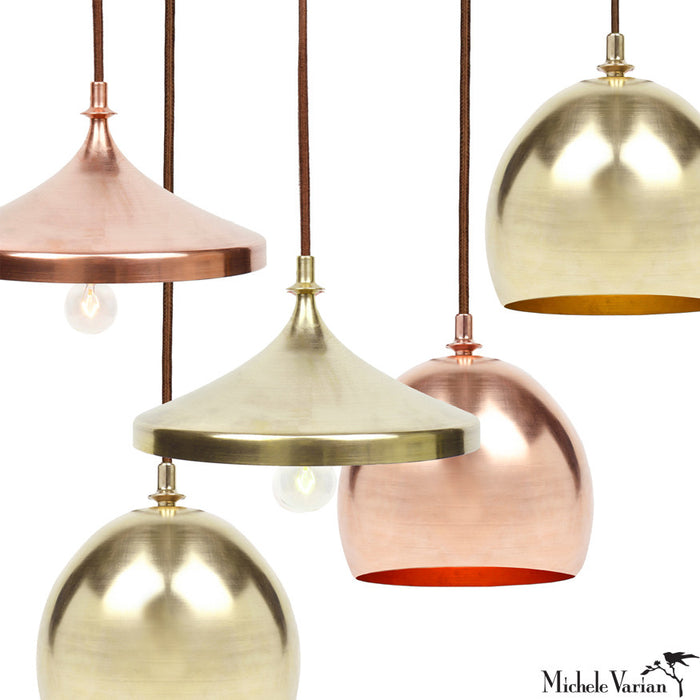 A collection of contemporary light fixtures on a white background.