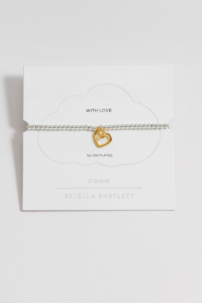 Silver bracelet with a heart charm on a white background