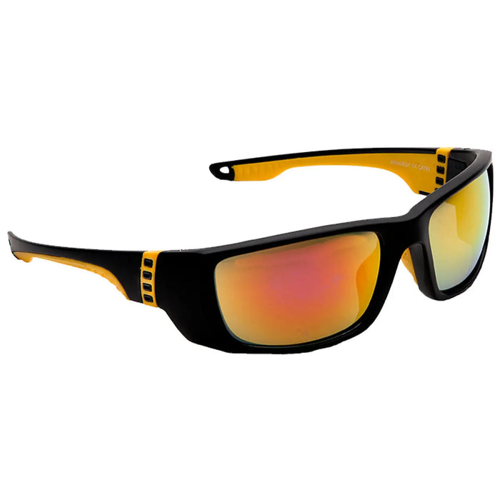 Black and yellow sunglasses rest at an angle showing their mirrored lenses reflecting shades of orange they are designed for protection against sunlight in outdoor environments