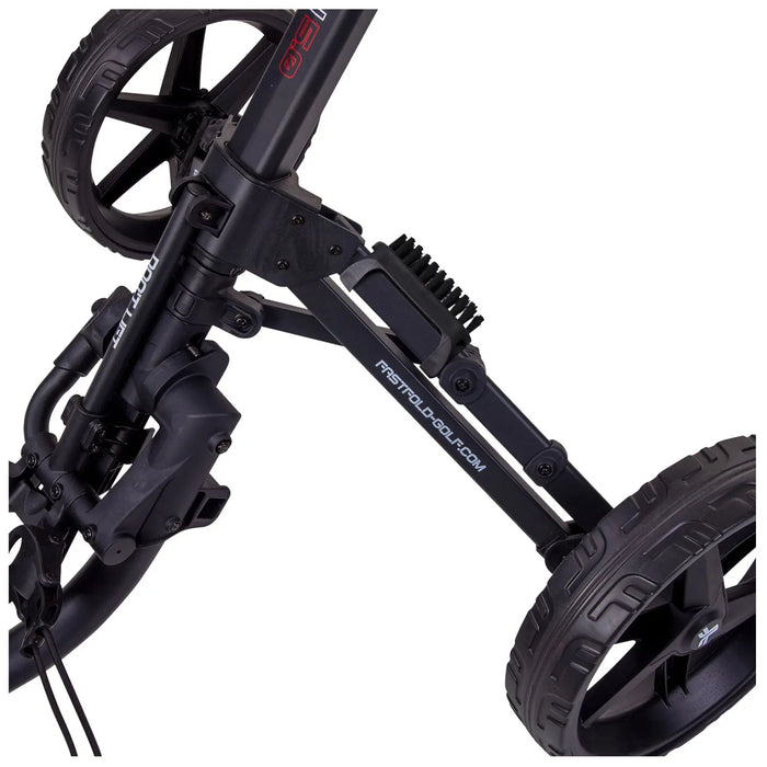 A golf push cart with large wheels is shown positioned at an angle against a flat surface the cart features a sleek black frame and various adjustable components for ease of use