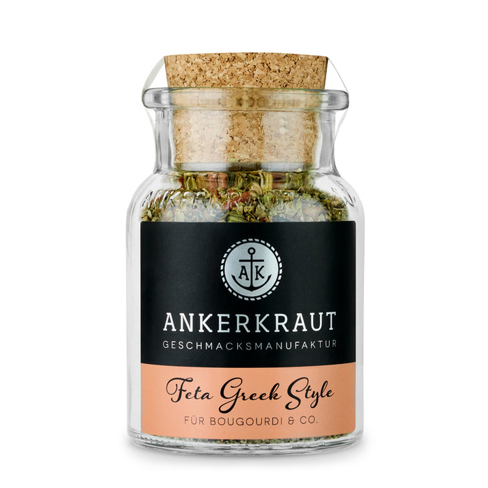 Ankerkraut Feta Greek Style im Korkenglas auf weißem Hintergrund.