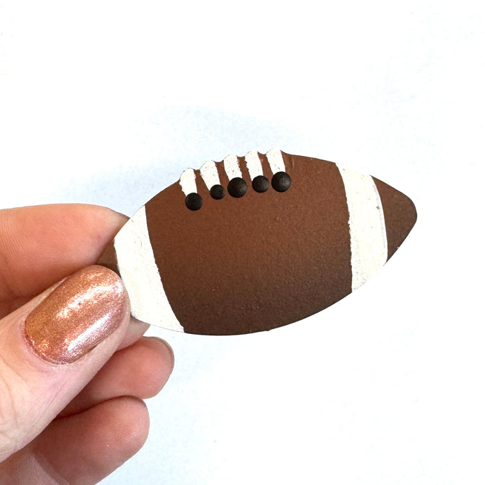 Football Magnet, Single