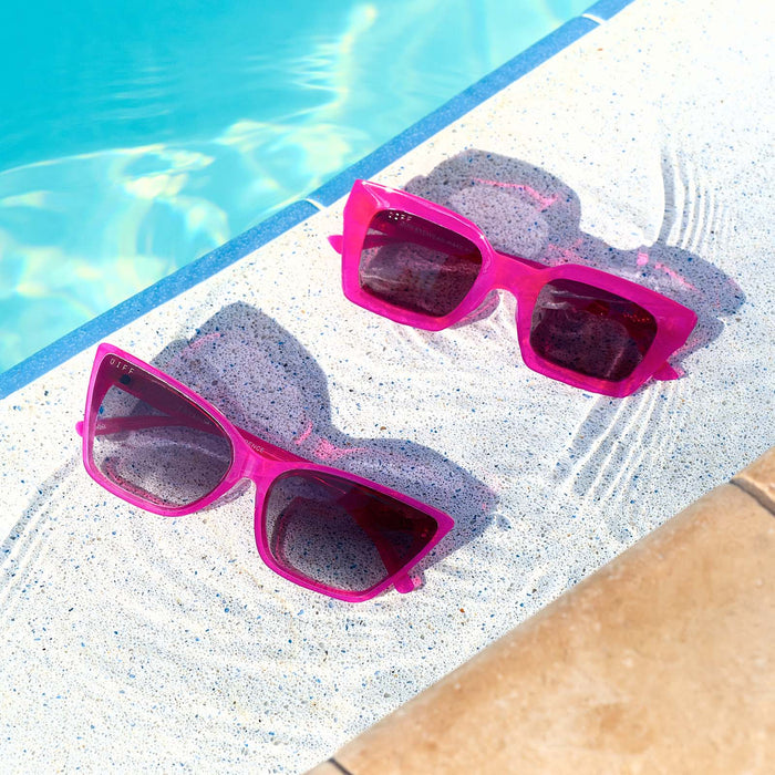 still life - alina and greer bright tulip pink sunglasses pool side