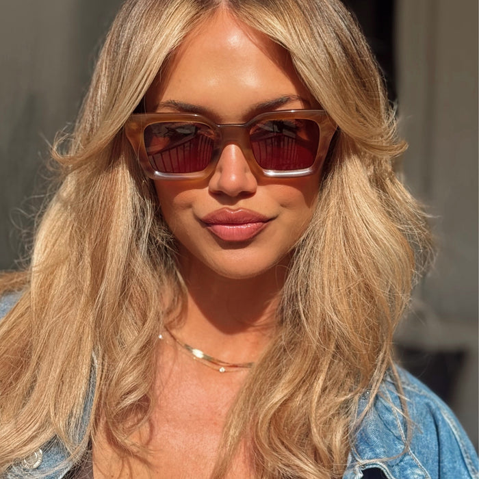 lifestyle - ashley smith wearing greer brown tawny sunlglasses with denim jacket