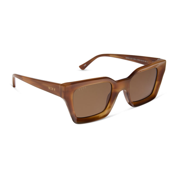 diff eyewear featuring the greer square sunglasses with a black frame and grey polarized lenses angled view