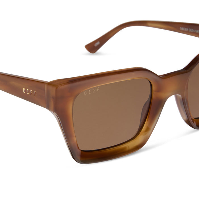 diff eyewear featuring the greer square sunglasses with a black frame and grey polarized lenses detailed view