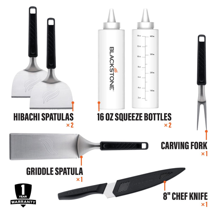 The toolkit includes 2 hibachi spatulas, 2 16 ounce squeeze bottles, 1 carving fork, 1 griddle spatula, and 1 8 inch chef knife.