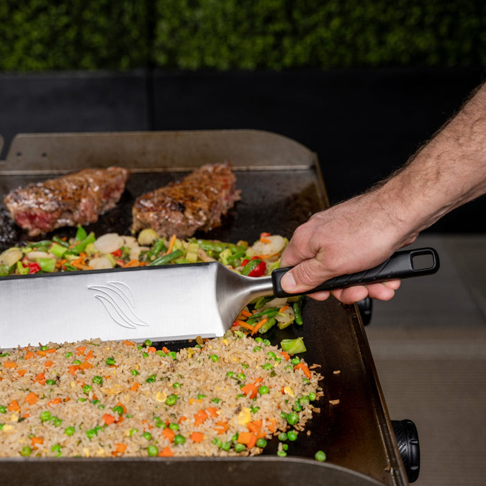 The griddle spatula is perfect for stirring fried rice and scooping.