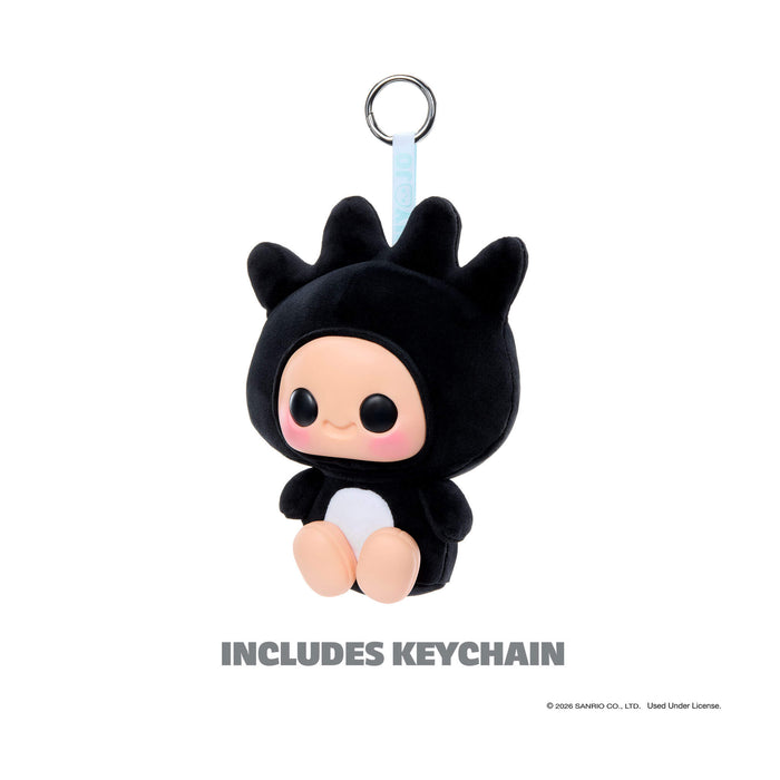 Black plush keychain with a cute design on a white background