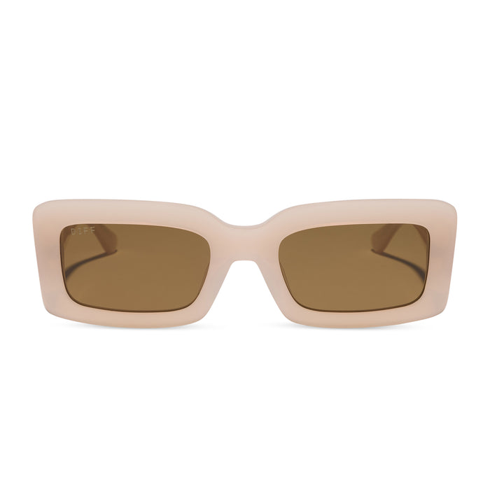 diff eyewear featuring the indy rectangle sunglasses with a milky blush acetate frame and brown polarized lenses front view
