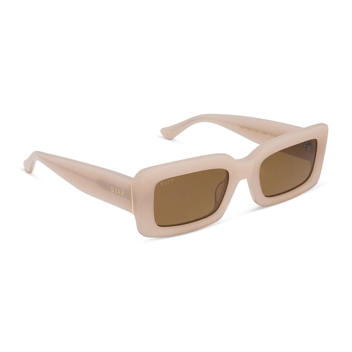 diff eyewear featuring the indy rectangle sunglasses with a milky blush acetate frame and brown polarized lenses angled view