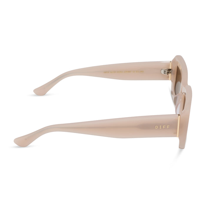 diff eyewear featuring the indy rectangle sunglasses with a milky blush acetate frame and brown polarized lenses side view