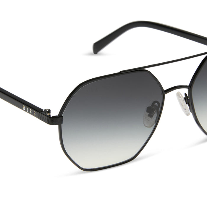 jojo fletcher x diff eyewear joelle navigator sunglasses with a black metal frame and grey gradient polarized lenses detailed view