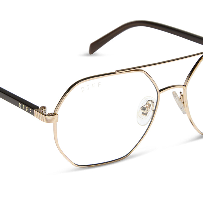 jojo fletcher x diff eyewear joelle navigator glasses with a gold metal and chocolate temple frame detailed view