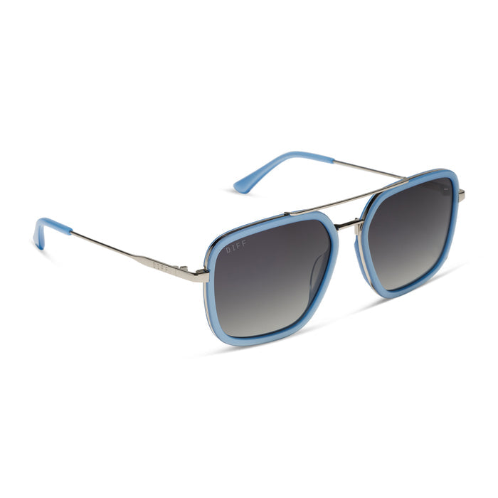 diff eyewear featuring the jordan navigator sunglasses with a light blue and silver frame with grey gradient polarized lenses angled view