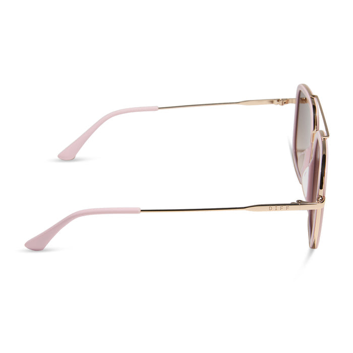 diff eyewear featuring the jordan navigator sunglasses with a powder pink with gold frame and brown gradient lenses side view